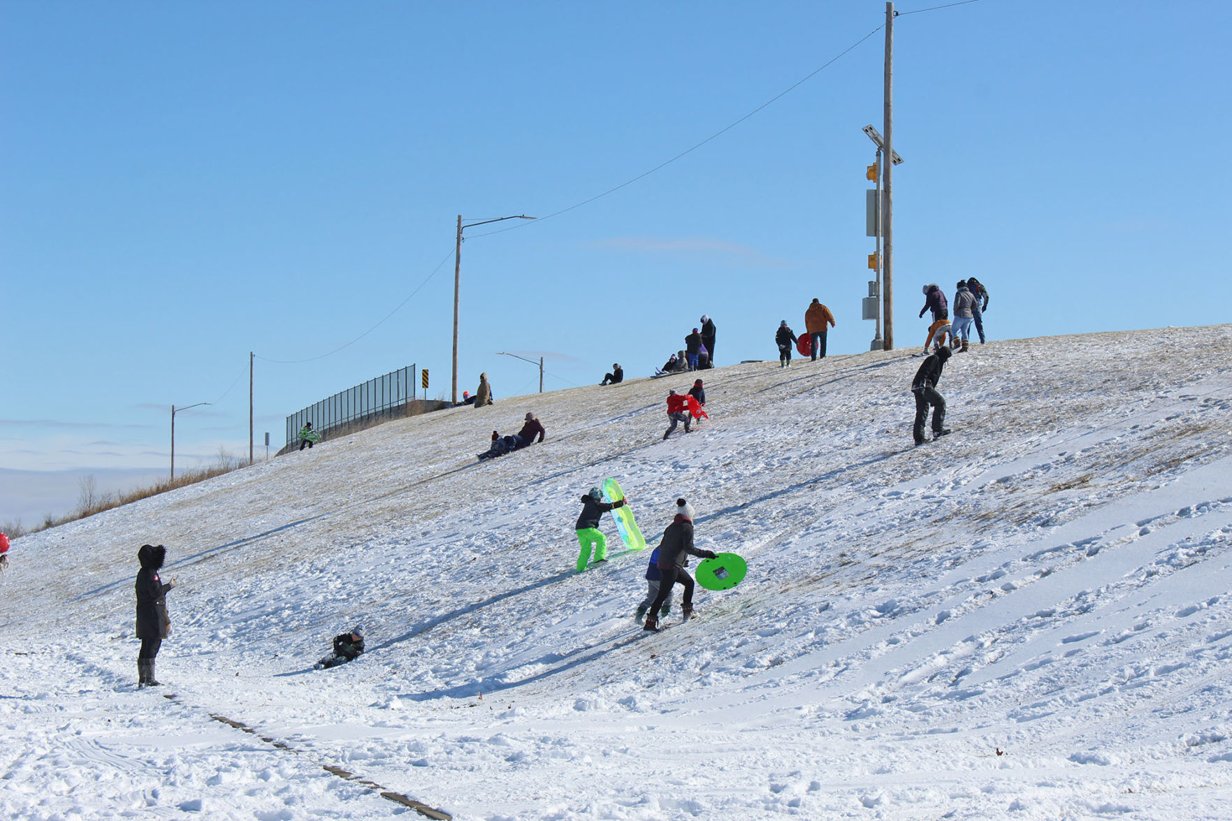 Locals enjoy snowfall on Saturday